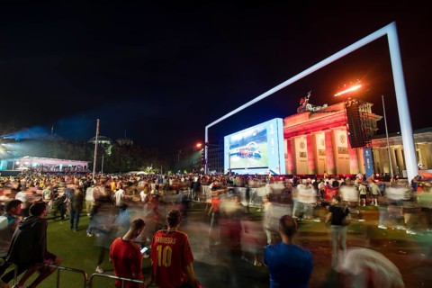 Football fans leaving the fan zone at the Brandenburg Tor after the final match between Spain and
