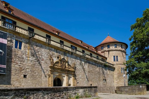 Portal, gate, round arch, bridge, cobblestones, stone figures, coat of arms, relief, decoration,