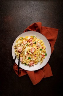 Tagliatelle pasta, in cream sauce with salmon, homemade, no people