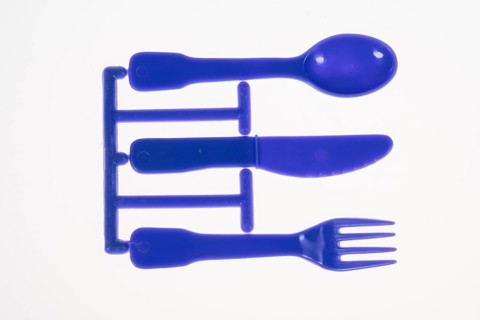 Plastic cutlery, spoon, knife, fork, still on the cast strand, children's cutlery