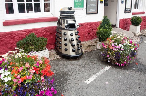 Dr Who Dalek model used as a waste bin, Aldbourne, Wiltshire, England, United Kingdom, Europe