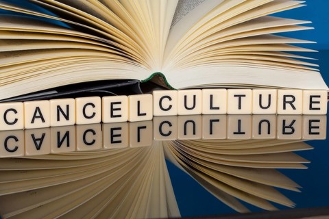 Symbolic image Cancel Culture: Letter cubes show the words Cancel Culture in front of a book