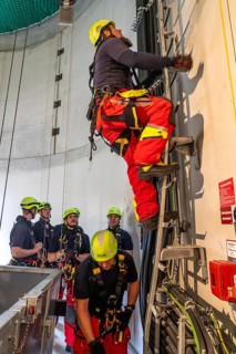 Height rescuers from the Oberhausen professional fire brigade practise abseiling from a wind