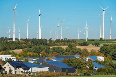 Wind farm above the village of Lichtenau, self-proclaimed energy town, houses with photovoltaic