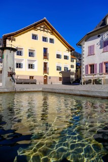 Fountain on the village square, Sent near Scuol, Engadin, Graubünden, Switzerland, Europe