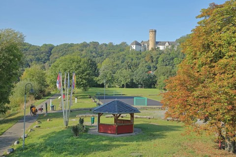 Lahntal with castle built 12th century, cycle path, cyclist, Dehrn, Runkel, Westerwald, Taunus,