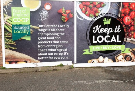 East of England Co-operative Society shop advertising boards hoardings, Woodbridge, Suffolk, UK