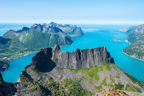 View over fjord Örnfjord, village Fjordgard, seen from mountain Grytetippen, island Senja, Troms,