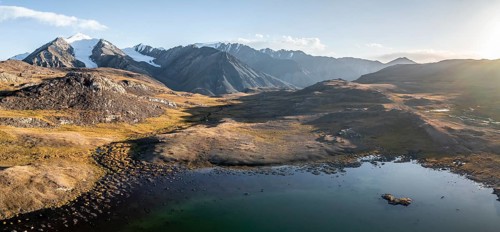 Aerial view, mountain peak and mountain lake, evening mood, Arabel Lake at Arabel Pass, Issyk Kul