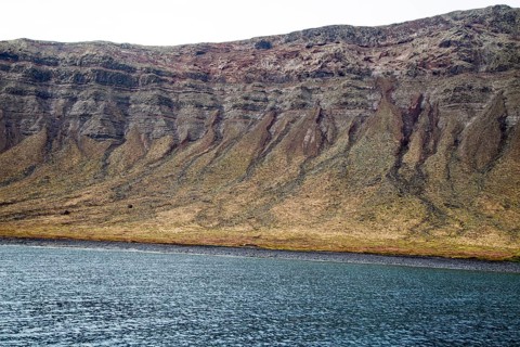 Steep gullied cliffs near Punta Fariones, Chinijo Archipelago, Orzola, Lanzarote, Canary Islands,