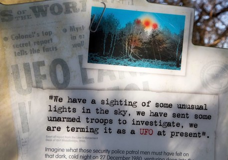 Newspaper headline reports on notice sign at Rendlesham UFO trail, Rendlesham forest, Suffolk,