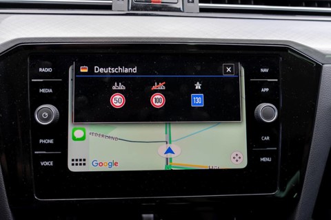 Navigation device indicates a border crossing, from the Netherlands to Germany, indicates traffic