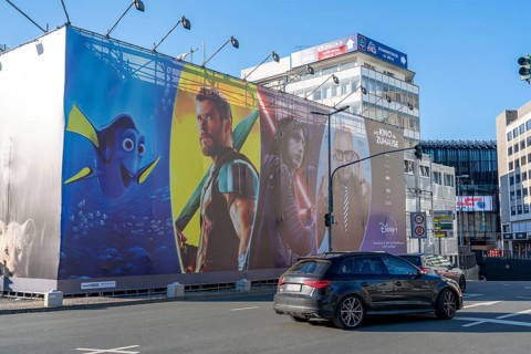 Advertising, large poster, for the new streaming service Disney Plus, in Düsseldorf