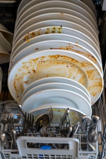 Dishwasher, full of dirty crockery
