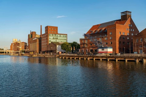 The inner harbour, in Duisburg, Küppersmühle building, and Werhahn-Mühle, granary with Explorado