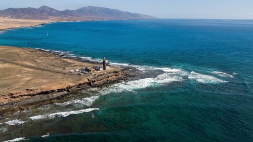 Aerial view of lighthouse Faro Punta de Jandia at southern tip of peninsula Jandia, in the