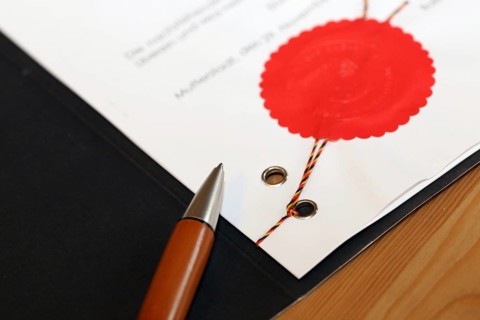 Notarised contract with red official seal