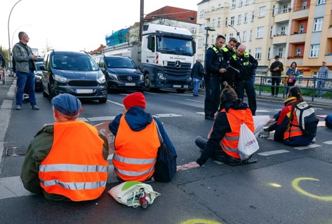Activists of the Last Generation block a street, Berlin, 24 04 2023