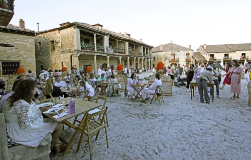 Plaza Mayor in the evening for the Conciertos de las Velas festival of lights, Pedraza, province of