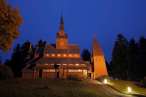 Night shot of the Gustav-Adolf-Stabkirche, twilight, blue hour, wooden church, lighting,