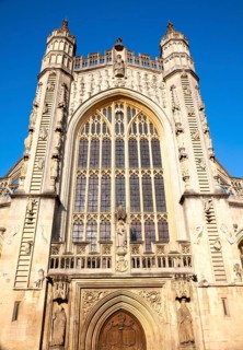 Angels and ascending and descending on ladders frontage, Abbey church, Bath, Somerset, England,