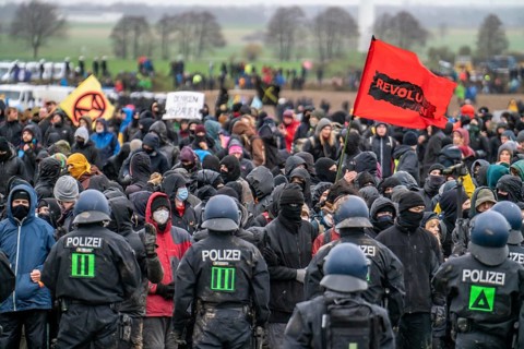 Violent clashes between thousands of demonstrators and the police, after a demonstration against