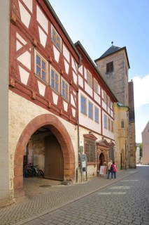 Restaurant Haus zum Güldenen Krönbacken and St Michael's Church, half-timbered house, archway,