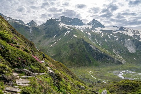 Picturesque mountain landscape with hiking trail, mountain peak with snow, peak Großer Mörchner,