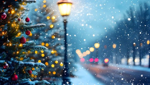 Christmas Eve with snowflakes fall under the light of a streetlamp with a decorated tree in the