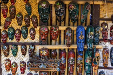 Traditional wooden masks on a market, colourful, handcraft, craftsmanship, tradition, face, travel,