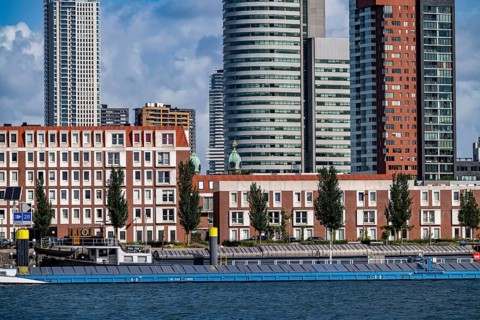 Harbour basin of the Maashaven, inland waterway port, jetties, residential buildings in the Kop van
