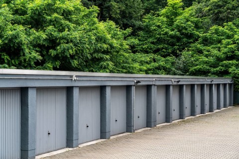 Garage courtyard in a housing estate in Duisburg-Neuenkamp, older residential complex, North