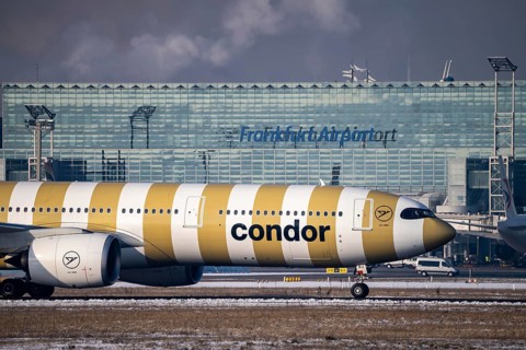 Condor, aircraft, on the taxiway at Frankfurt FRA airport, Fraport, in winter, Hesse, Germany,
