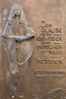 Detail of the memorial plaque at the grave site of the humanist Carita Pirkheimer, former monastery