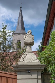 Vase attachment on a courtyard gate, 1774, behind the tower of the parish church of St John the