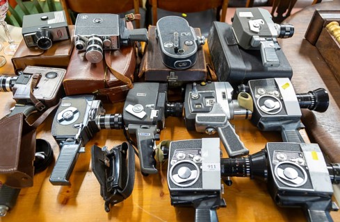 A collection of vintage cine film cameras on display at auction, UK