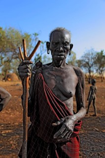 South Ethiopia, in the Maco National Park, in the village of the Mursi, old Mursi woman, with naked