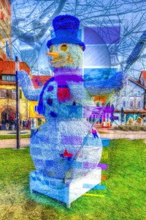 Snowman with hat, carrot nose, broom, top hat, scarf, illuminated art figure, mouth, eyes, funny