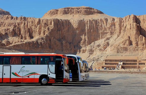 Car park for buses in front of the mortuary temple of Hatshepsut, Hatshepsut Temple in Deir