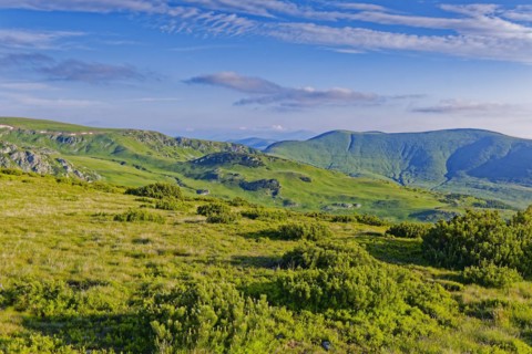 View of the mountains of the Transylvanian Alps in the southern Carpathians from a height in the