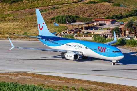 A TUI Airways Boeing 737-800 aircraft with the registration G-FDZS at Skiathos Airport, Greece,