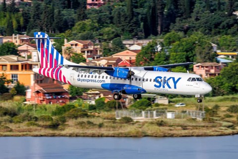 An ATR 72-200 Sky Express aircraft with the registration SX-IPO at Corfu Airport, Greece, Europe