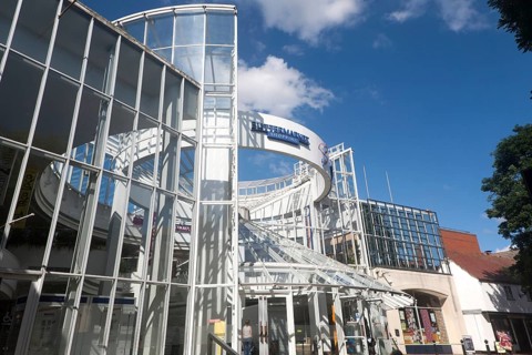 Modern glass and steel architecture of the Buttermarket shopping centre in the town centre of