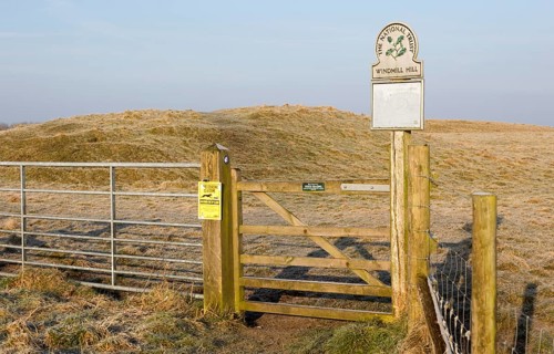 National Trust sign at gateway entrance to Windmill Hill, a Neolithic causewayed enclosure, near