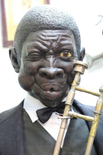 Mannequin figure black male jazz musician inside famous historic Los Gatos Cervecerias bar, Madrid,
