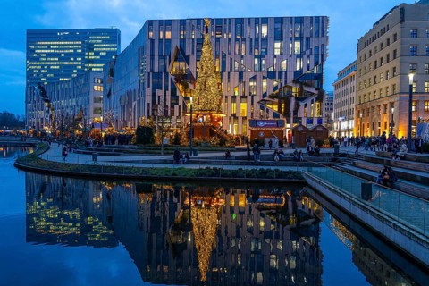 Christmas market, at the Kö-Bogen shopping centre, in the city centre of Düsseldorf, at the back