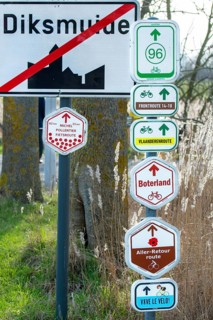 Bike node sign and 14-18 front route signposts giving directions for cycling routes, bicycle