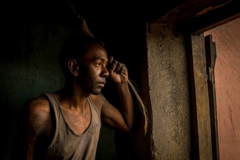 Workers in an aluminium recycling factory in the highlands of Madagascar