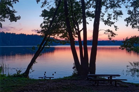 Evening atmosphere at the rest area on Lake Rospuda in northern Poland. Augustow, Podlaskie,