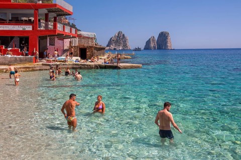 Marina Piccola bay on the south coast with the Faraglioni rocks, the island's landmarks, Capri,